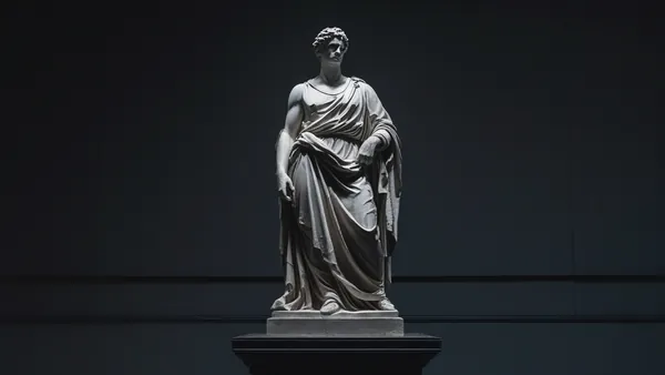 Coroa caindo de pedestal em fundo escuro